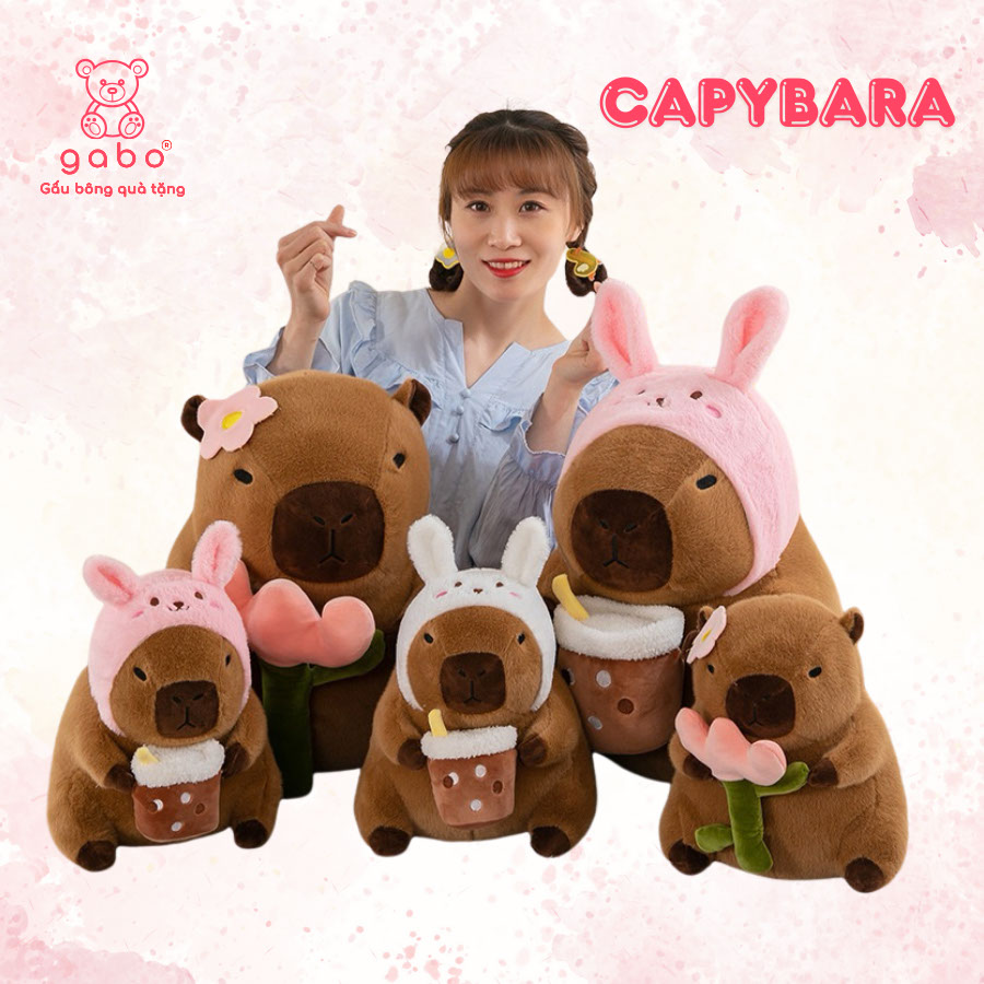 Gấu bông quà tặng gấu bông capybara tai thỏ gabo g Gấu Bông Capybara Tai Thỏ Cầm Trà Sữa - Chuột Lang Mê Trà Sữa
