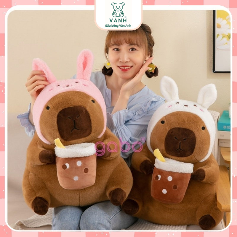 Xưởng sản xuất kinh doanh thú bông quà tặng Quảng Châu cao cấp Capybara Tai Thỏ Cầm Trà Sữa - Chuột Lang Mê Trà Sữa