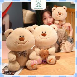 Gấu Bông Gấu Mặt Cười Cầm Bánh - Gấu Đeo Nơ 1 Gấu Bông Gấu Mặt Cười Cầm Bánh - Gấu Đeo Nơ