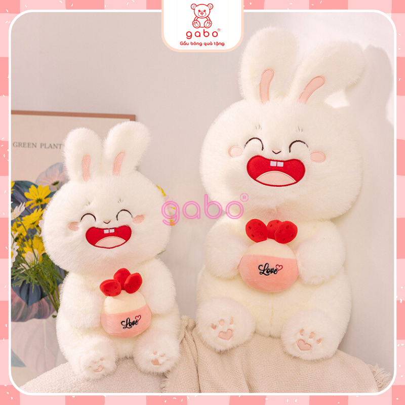 Xưởng sản xuất kinh doanh thú bông quà tặng Quảng Châu cao cấp Gấu Bông Thỏ Trắng Ôm Bánh Dâu, Thỏ Mặt Cười Cầm Bánh