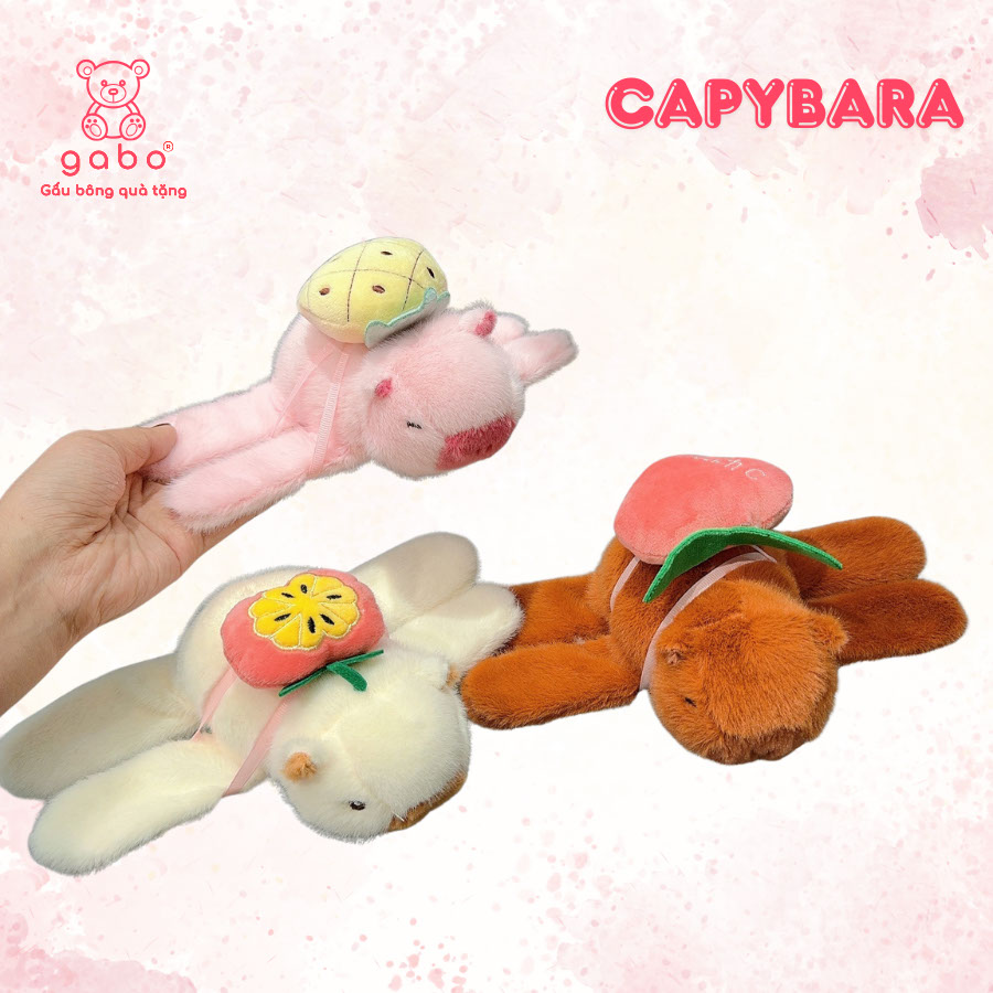 Gấu bông vòng tay capybara là mẫu gấu bông cao cấp Gấu Bông Vòng Tay Capybara - Chuột Lang Nước Ôm Vợt